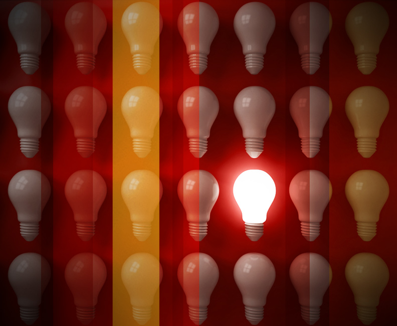 How to find your brand's differentiators - image of multiple light bulbs with one lit up in the middle