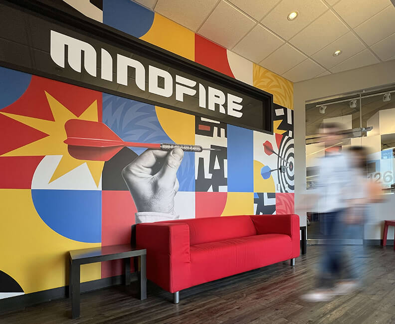 MindFire rebrand blog post - image of main lobby with new MF branding