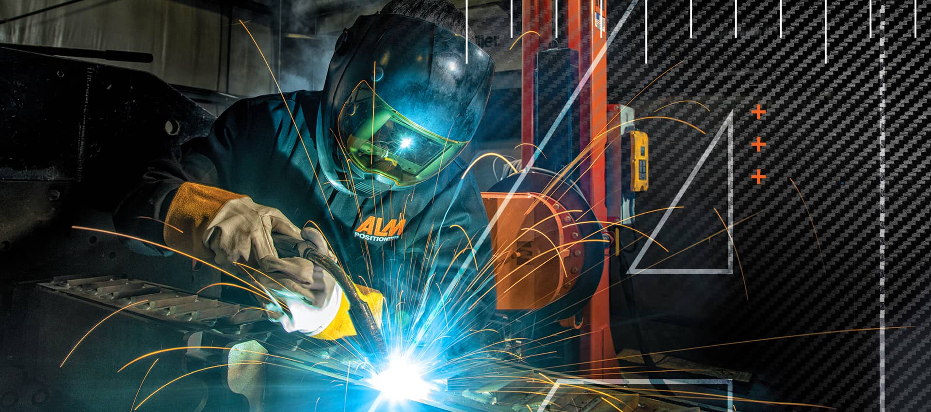 Person welding with sparks flying