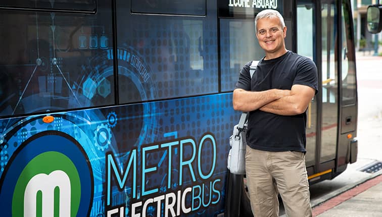 MetroLINK rider standing outside of bus